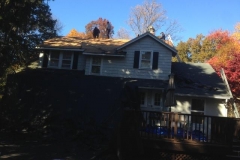 Removing the shingles and putting in the new wood