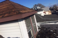 Removing all shingles before we replace